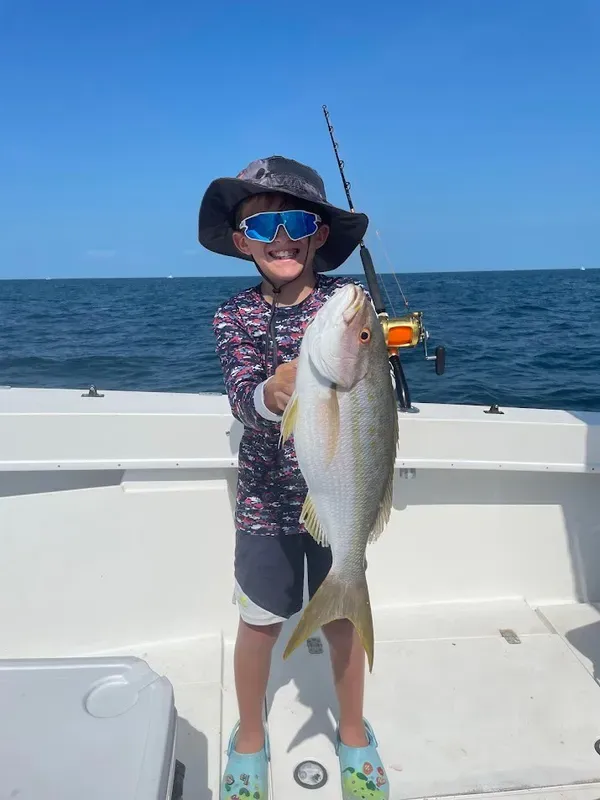 Big smiles and big yellowtails!